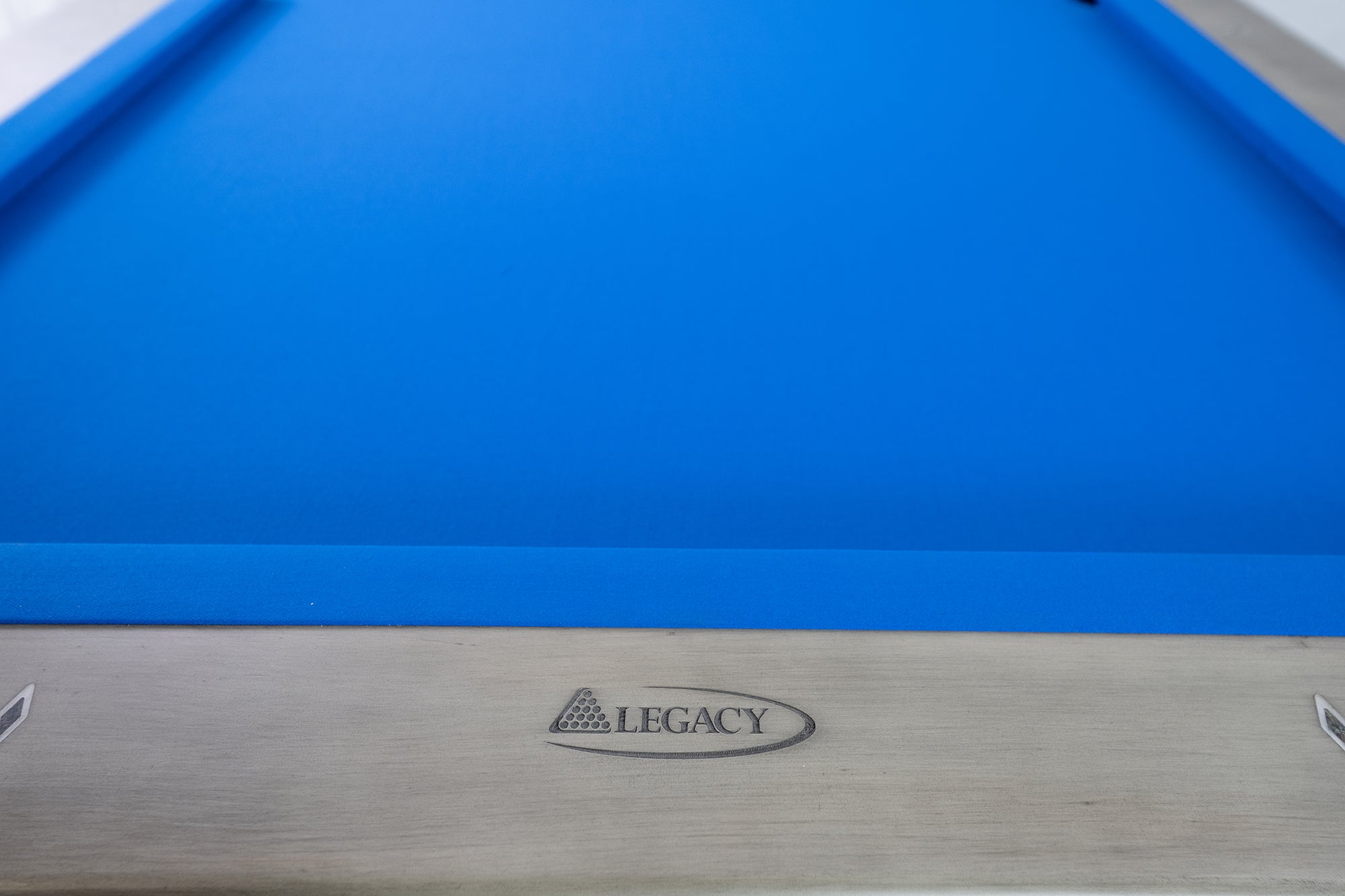 Legacy Billiards Holston Pool Table in Overcast Finish with Blue Cloth - Logo Rail Closeup